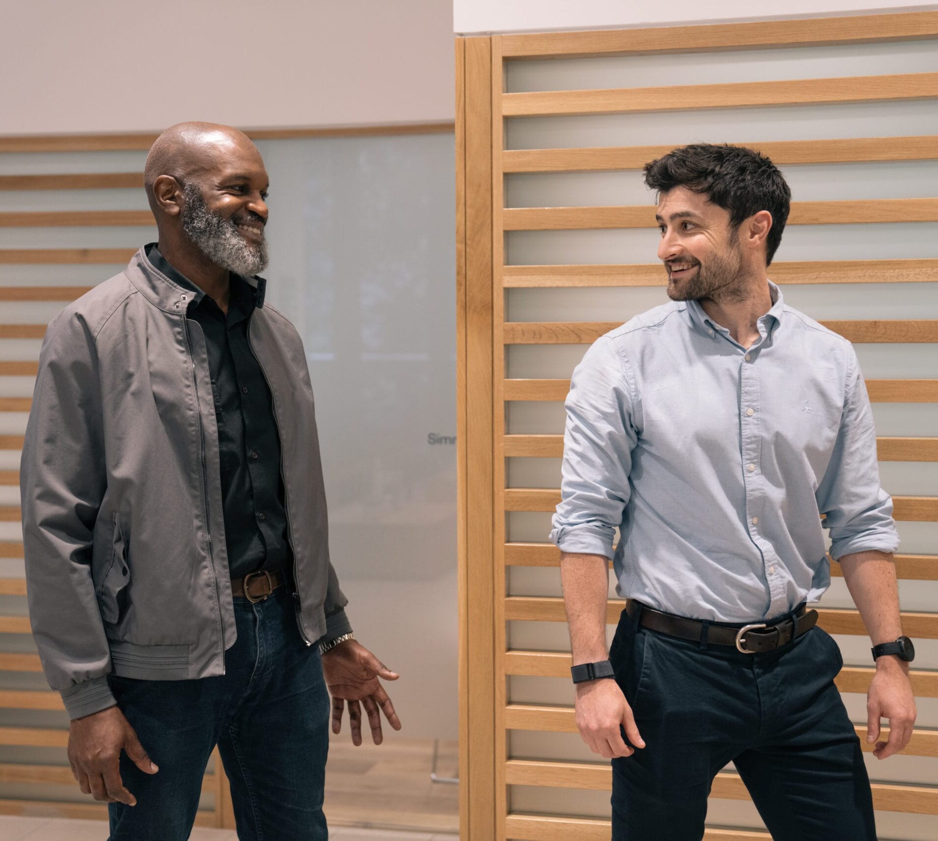 patient and clinician walking to appointment room in clinic